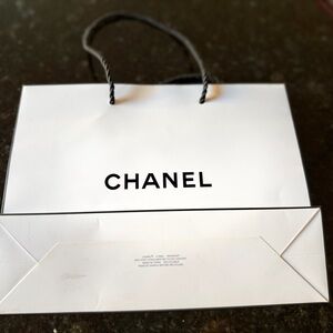 Empty CHANEL White and Black Shopping Bag